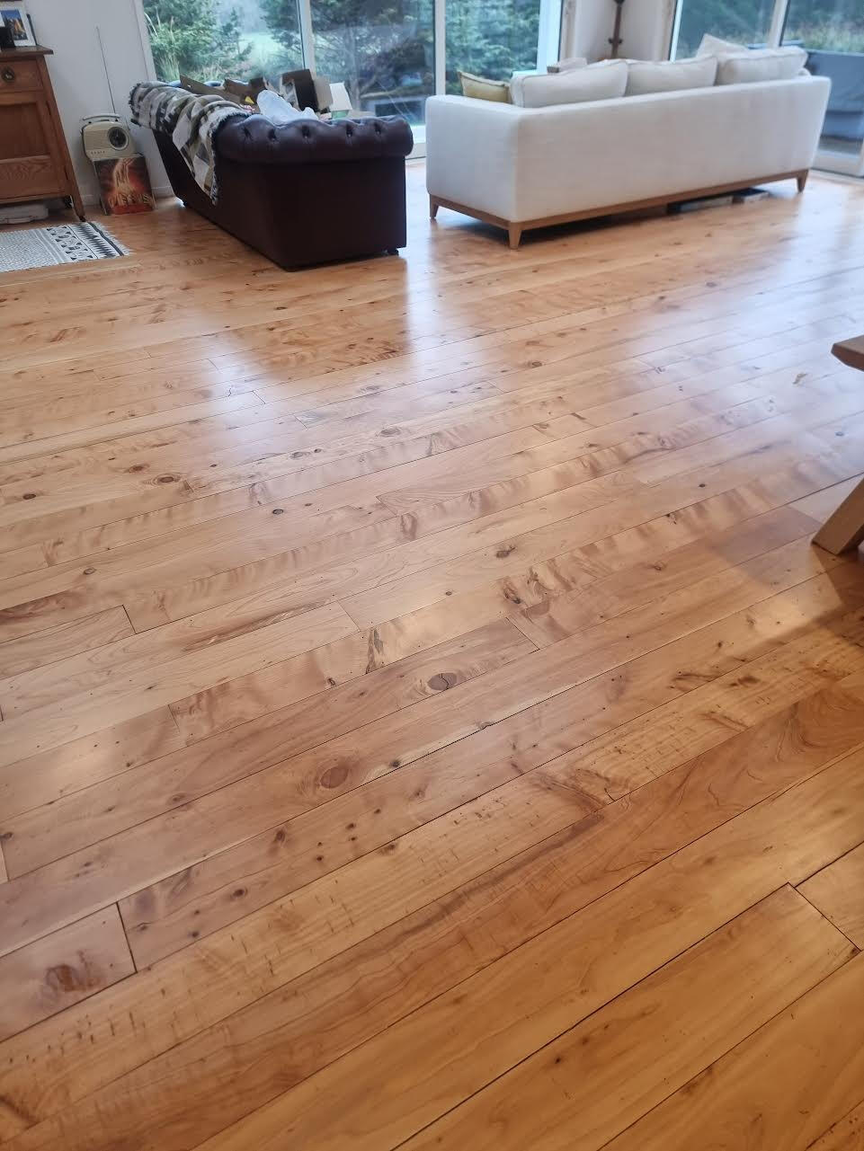 Macrocarpa floor polishing in Wellington home